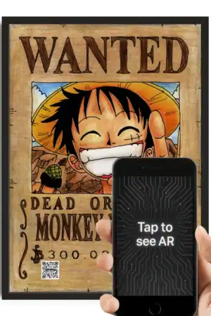 Colorful "Wanted Dead or Monkey" poster with a cartoon monkey character and QR code, displayed behind a smartphone with "Tap to see AR" text, illustrating augmented reality features of The Radical Store.
